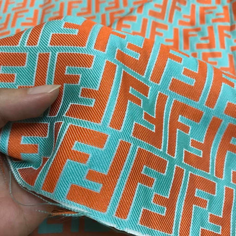 Designer Inspired Fendi Fabric Orange Green - FabricViva